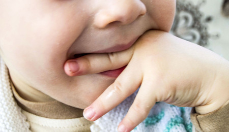 sucked the baby's tiny fingersの写真素材