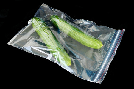 refrigerator bag and cucumber insideの写真素材