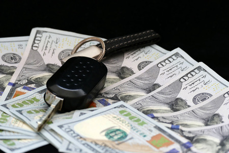 rich businessman, mobile phone, wallet, dollar and car key,の写真素材