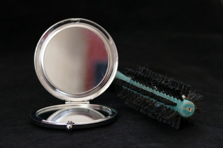 close-up of a mirror on a black backgroundの写真素材