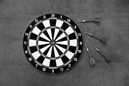 expressing success with dart arrows, success and dart board,