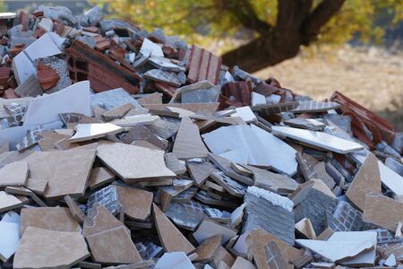 people pollute the environment they live in, concrete and brick remains, construction waste,の写真素材