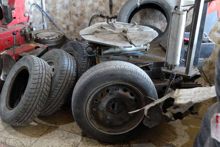 a tire repairer repairs car tires, tire change,