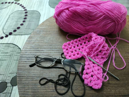 handwork rope and glasses on the table,