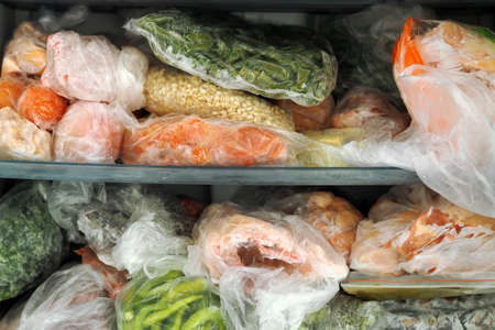 frozen foods, frozen vegetables and meats in the freezer,