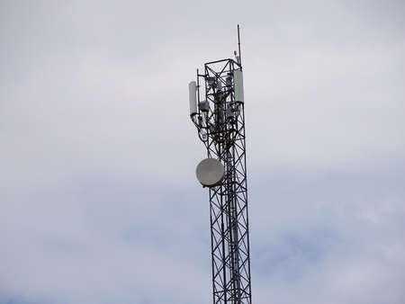 cloudy sky and telephone base station, telephone base station transmitters,