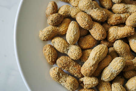 close-up shelled peanuts,shelled and salted peanuts,roasted peanuts,