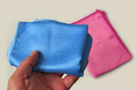 colorful microfiber cleaning cloths used for household cleaning, close-up microfiber cloths on a...