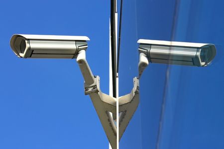 security camera and glass facadeの写真素材
