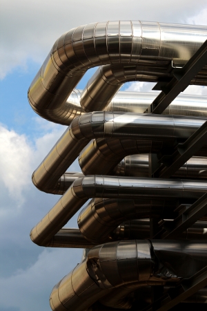 metal oil pipe in refinery under skyの写真素材