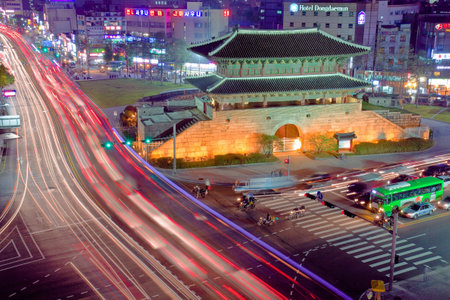 Traffic trails and old fortress gateのeditorial素材