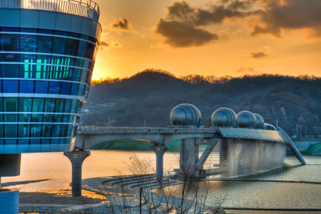 View of facility on the river by sunsetのeditorial素材
