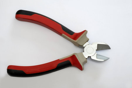 Side cutting tool with rubber and insulating handlesの写真素材