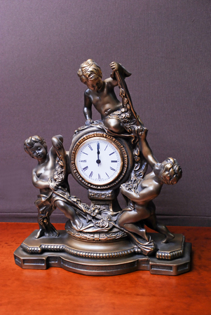 beautiful carved clock on the counter of the storeの写真素材