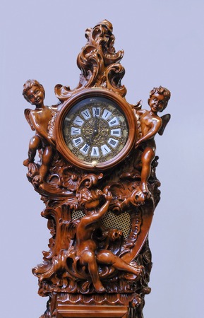 beautiful carved clock on the counter of the storeの写真素材