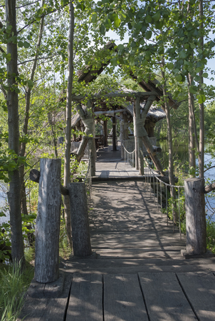 Hut on an old pond on stiltsの写真素材