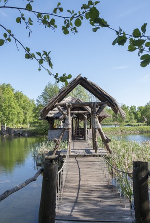 Hut on an old pond on stiltsの写真素材