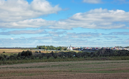 Landscape with a village in the backgroundの写真素材