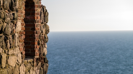 Ruin wall with view of the seaの写真素材