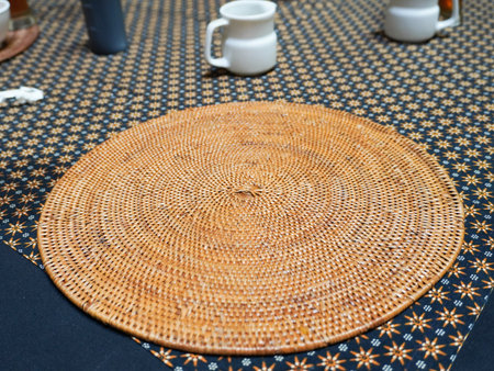 Wicker table mat in a restaurant, closeup of photo.の写真素材