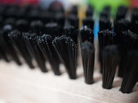 Close up of black plastic brushes for cleaning in a shop, stock photoの写真素材