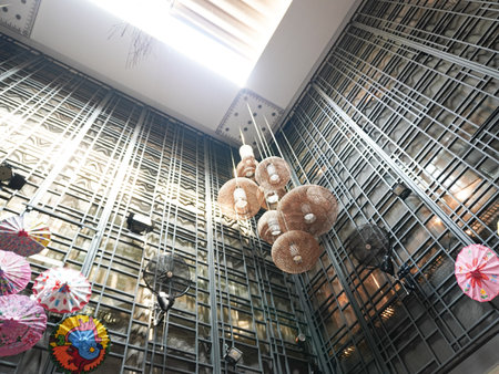 Unidentified people decorate the ceiling at The Central World shopping mall.の写真素材