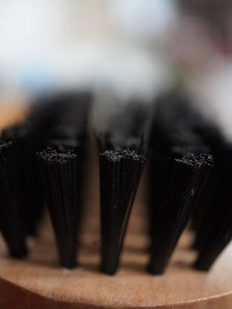 Close-up of black plastic toothbrushes. Selective focus.の写真素材