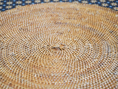 Rattan texture for background. Close-up of a straw hat.の写真素材