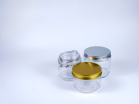 Empty glass jar on white background. Clipping path included.の写真素材