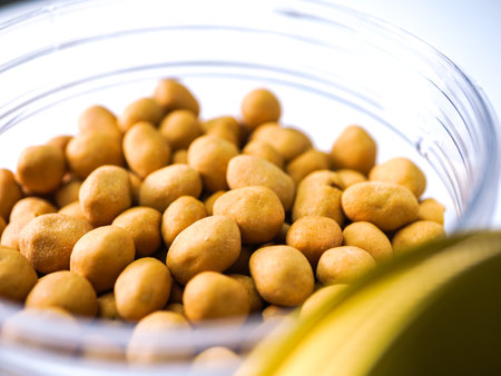 Bowl of chickpeas on a white background. Selective focus.の写真素材