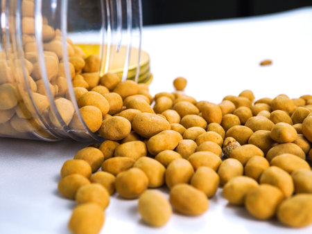 Powdered soybean in a glass jar on white backgroundの写真素材