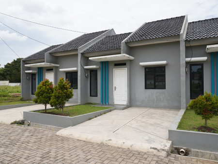 House with blue door and grey wall in Thailand, Chiang Maiの写真素材