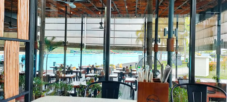 Panoramic view of the outdoor dining area in a summer cafe.の写真素材
