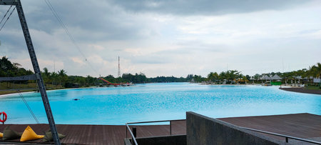Swimming pool in hotel resort, panoramic view of swimming poolの写真素材