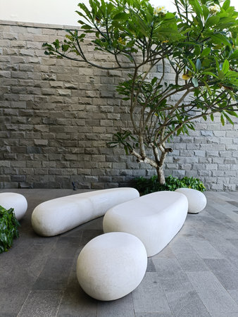 Modern stone bench in the lobby of a modern office building.の写真素材