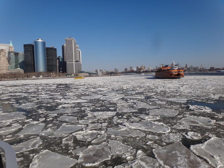 Staten Island Ferry on a frozen Hudson riverの写真素材
