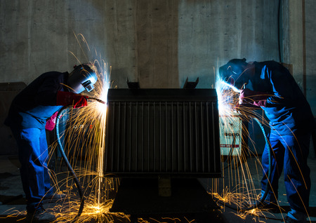 Industrial Worker, laborer at the factory weldingの写真素材
