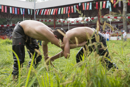 Two oil wrestler wrestling in Kirkpinar, Edirneのeditorial素材