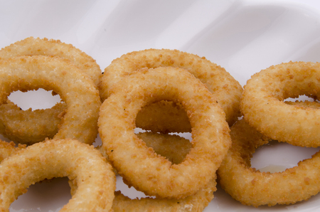 onion ring in white plateの写真素材