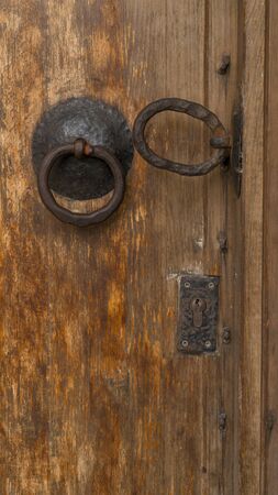 old wooden door with rusty locksの写真素材