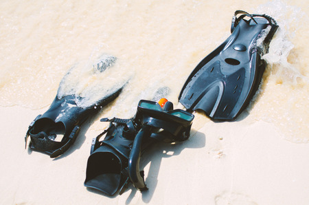 snorkel and mask on the beach.の写真素材