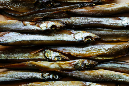 Smoke cured capelins top view selective focusの写真素材