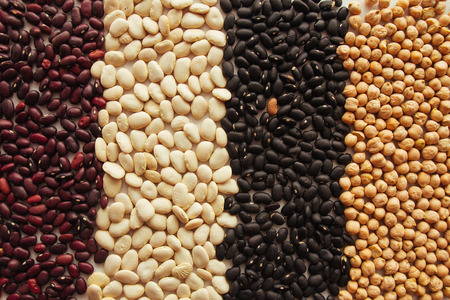 Chickpeas, red, lima and black beans top view selective focusの写真素材