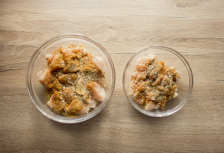 an image of sliced ââchicken with spicesの写真素材