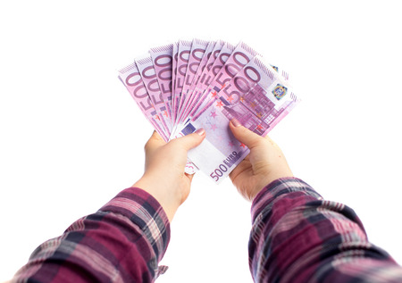 an image of hand a lot of money