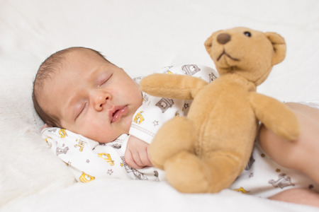 an image of cute sleeping babyの写真素材