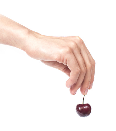 an image of Sweet cherries in the hands of european girlsの写真素材
