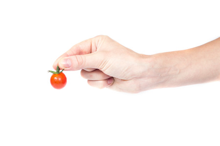 an image of tomato in woman handsの写真素材