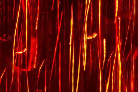 an image of bright sparks on colorful background with bokeh effect