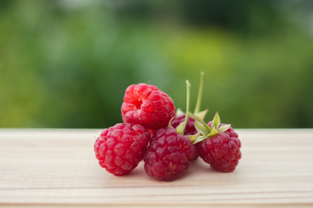 an image of Raspberry on a wooden tableの写真素材